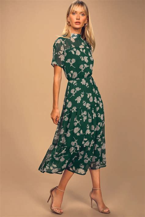 Floral midi dress in green .